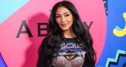 Nicole Scherzinger tik pred koncertom polila vrelo vodo po nogi - Modna.si